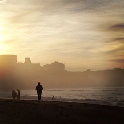 Scenic view of sea at sunset