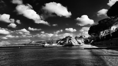 Scenic view of sea against cloudy sky