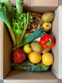 Grocery shopping or delivery. box with variety of fruits and vegetables