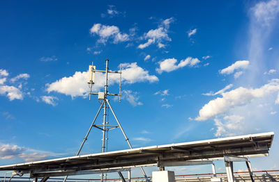 Contract mobile towers cloud sky backgruond, communications tower and solar panels that supply