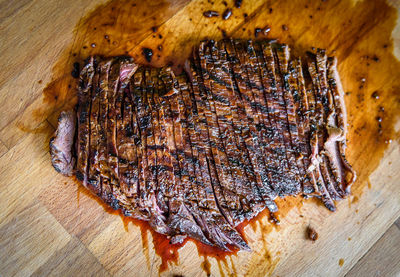 High angle view of dried leaves on cutting board