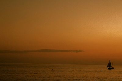 Scenic view of sea at sunset