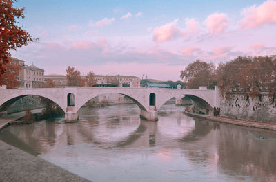 Bridge over river against sky in rome, italy
