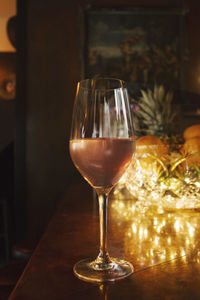 Close-up of wine glass on table