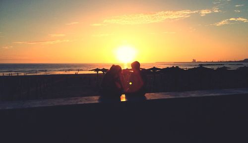 Scenic view of sea at sunset