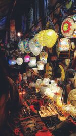 Illuminated chandelier at market stall