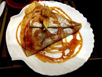 Close-up of dessert served on table