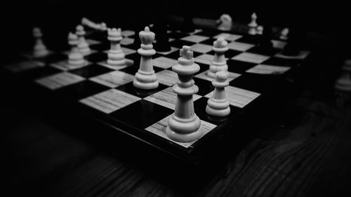 Close-up of chess board on table