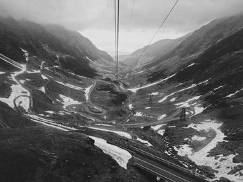 Aerial view of mountain road against sky