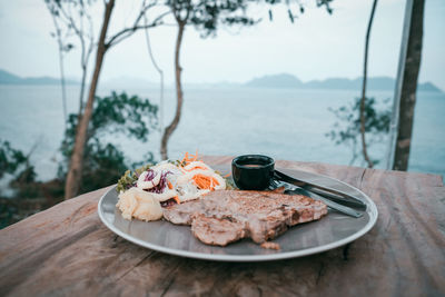 High angle view of breakfast on table in sea