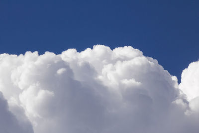 Low angle view of clouds in blue sky