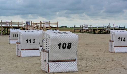 Beach chairs on a sandy beach on the north sea in sankt peter-ording