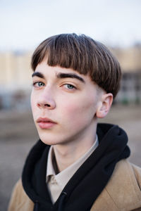 Close-up portrait of serious young man