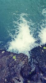 Waves splashing on rocks