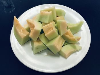 High angle view of fruits in plate on table
