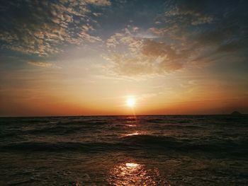 Scenic view of sea at sunset