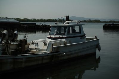 View of boats in calm lake