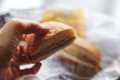 Close-up of hand holding ice cream