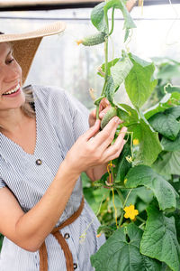 Midsection of woman holding food outdoors