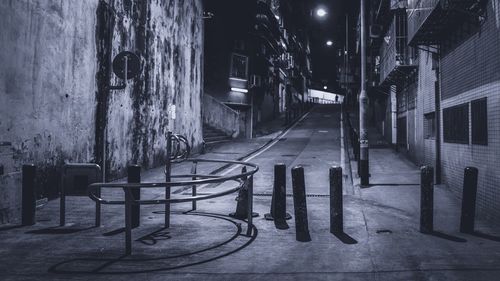 Empty road amid residential buildings