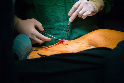 Low angle view of hands working