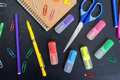 Directly above shot of office supplies on table