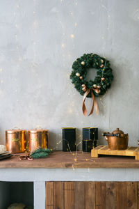 Home new year's kitchen interior. decorations with garlands and a christmas wreath.