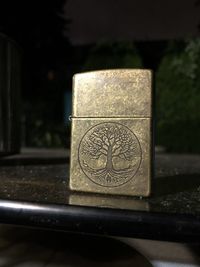 Close-up of coin on table