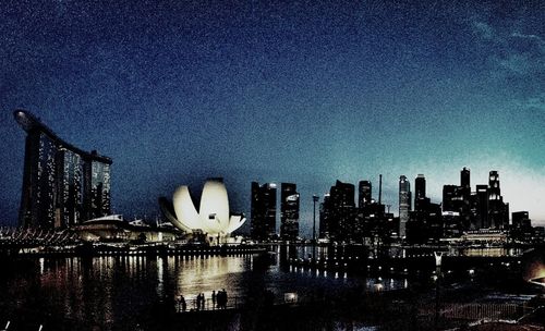 Illuminated cityscape at night