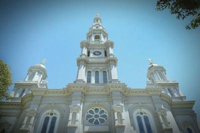 Low angle view of building against blue sky