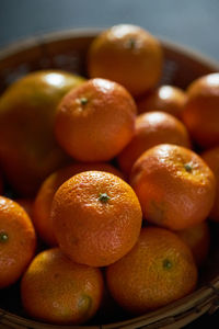 High angle view of orange in basket
