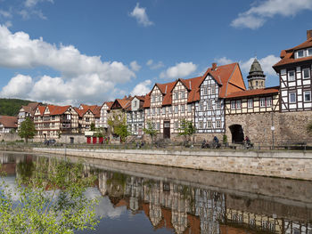 Panorama of colorful houses at the fulda riverside in historic town hannoversch munden, germany