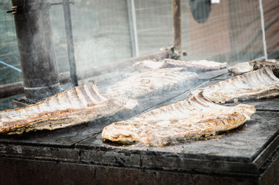 Close-up of fish on barbecue grill