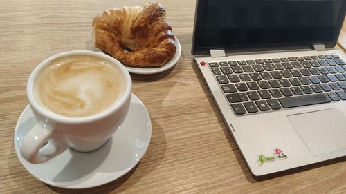 Coffee cup on table