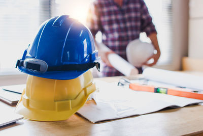 Close-up of man working on table