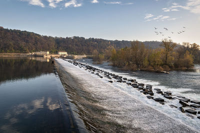 Scenic view of river against sky