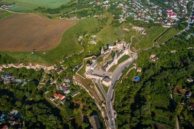 Aerial view of the romantic stone medievel castle on top of the mountain