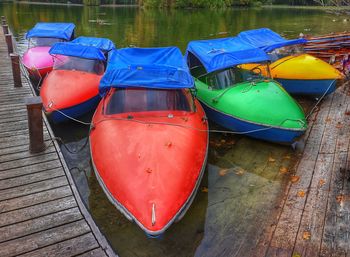 High angle view of multi colored boats moored in lake