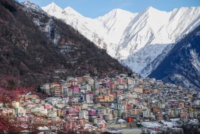 High angle view of townscape and mountains