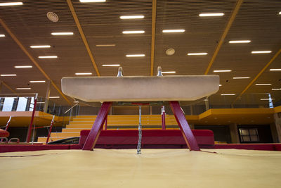 Low angle view of empty chairs in building