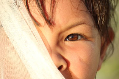 Close-up portrait of girl with brown eyes