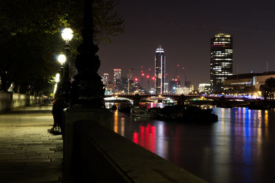 Illuminated buildings in city at night