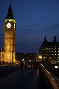 View of clock tower at night