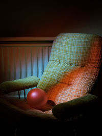 Close-up of multi colored balls on table at home