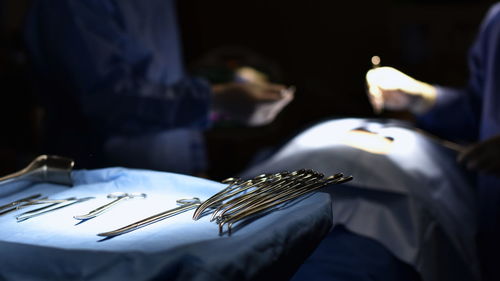 Defocused image of surgeons in operating room