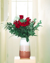 Close-up of red flower pot on plant