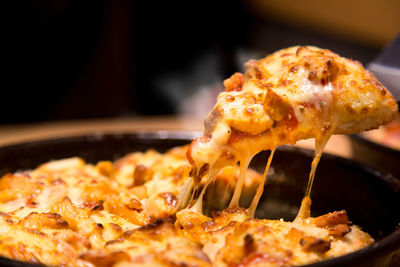 Close-up of pizza served in plate