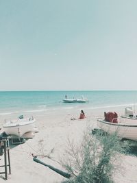 Scenic view of beach against clear sky