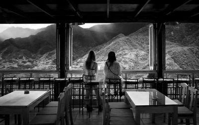 Rear view of people sitting in restaurant