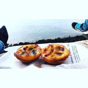 High angle view of ice cream in sea against clear sky